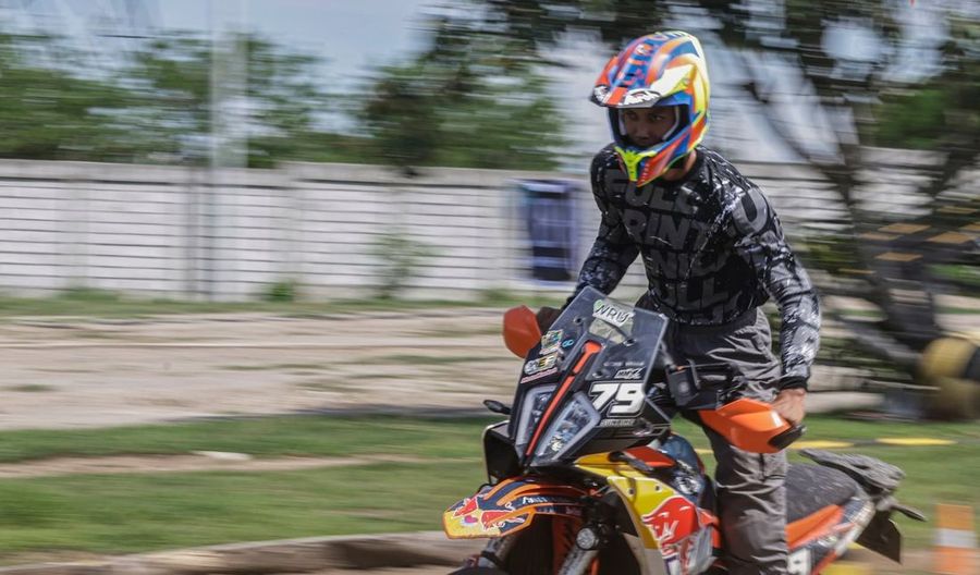 Rider leaning into a corner on the motorcycle park track