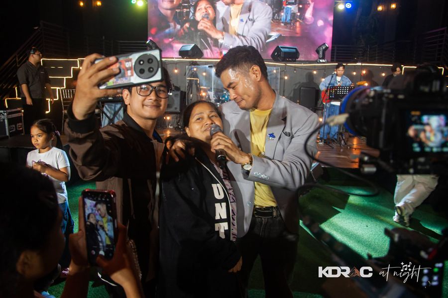 Fans getting photos with the performer at the Pavilion